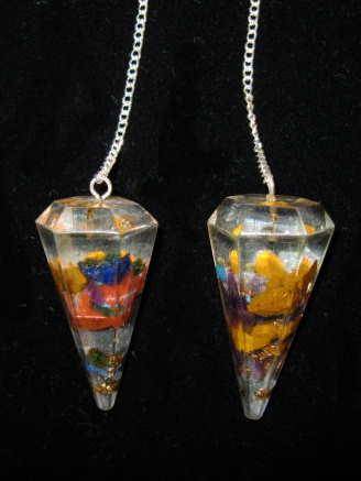Resin Orgone pendulum with gemstones and copper.