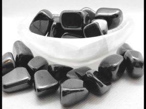 Tumbled Shungite Stones in Selenite Heart bowl
