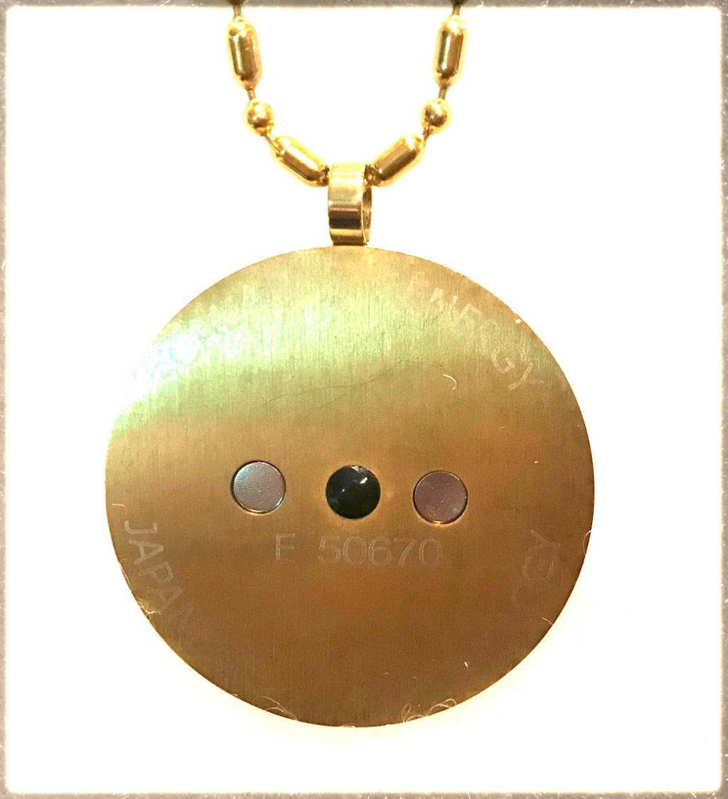 back of 18K gold plated stainless steel scalar energy wellness pendant with tormaline and germanium